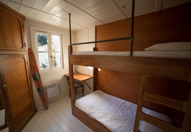 The children's room in the outbuilding with two bunk beds