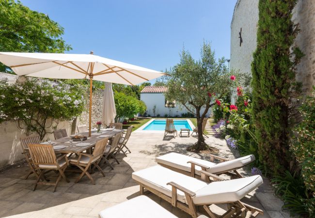 View of large terrace, garden and pool 