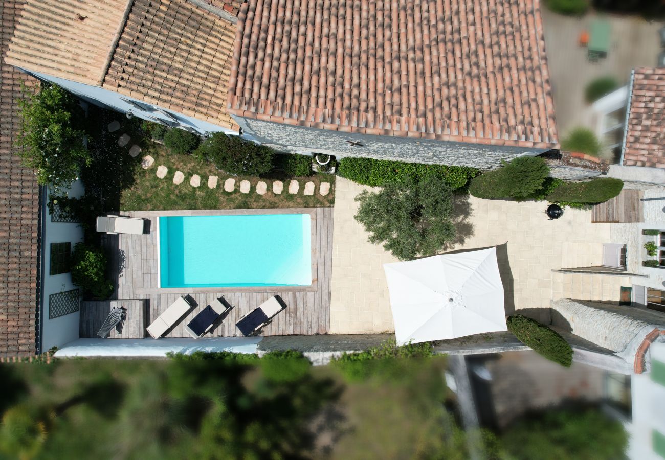 Aerial view of the house, terrace and pool 