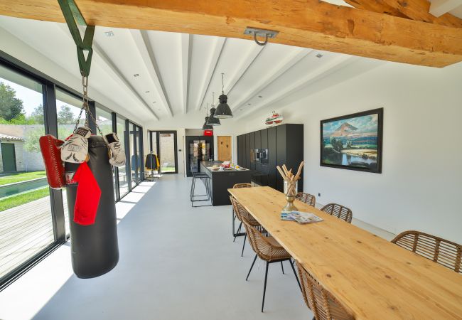 dining room and kitchen with punching bag
