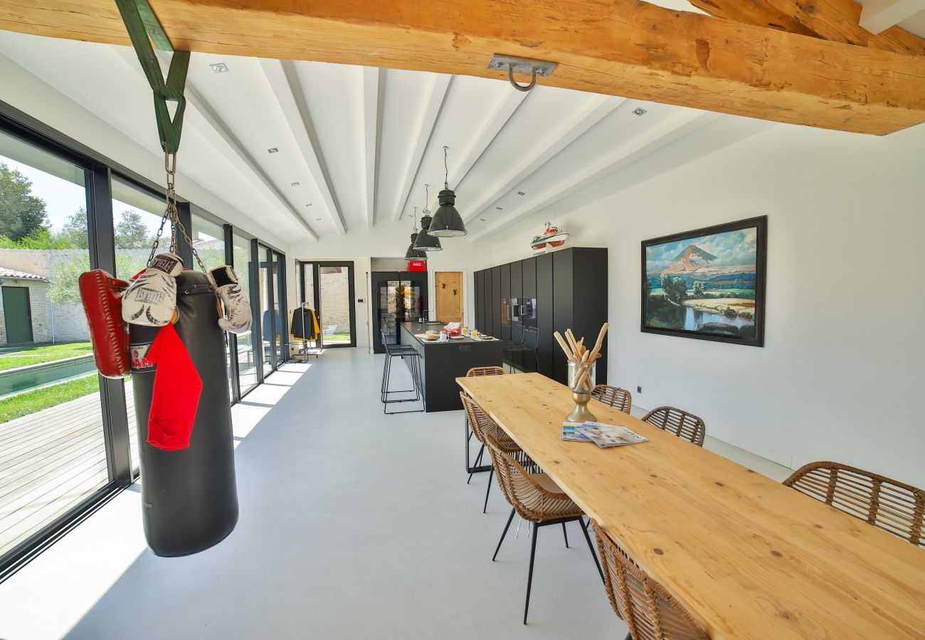 dining room and kitchen with punching bag