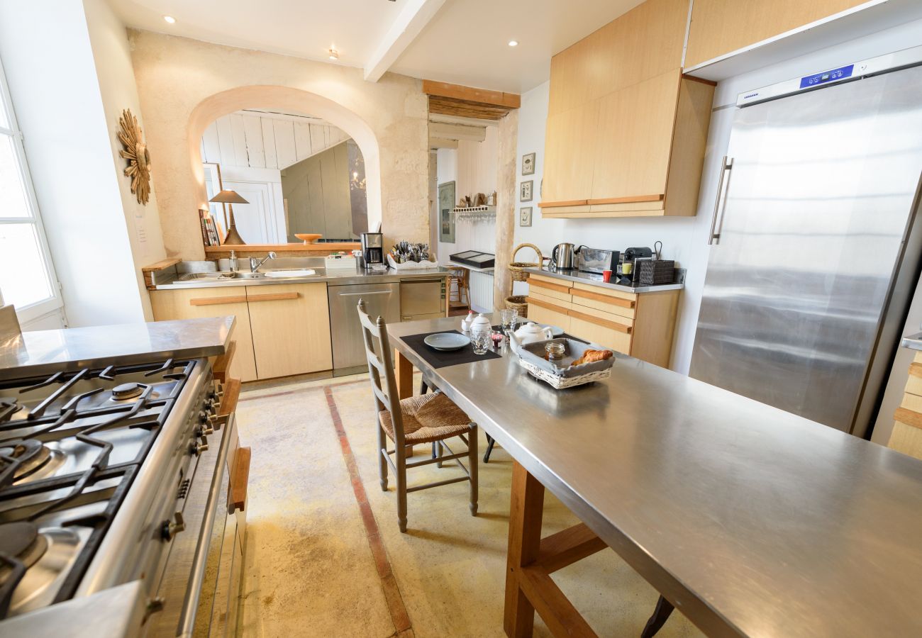 Large kitchen with central island and gas cooker