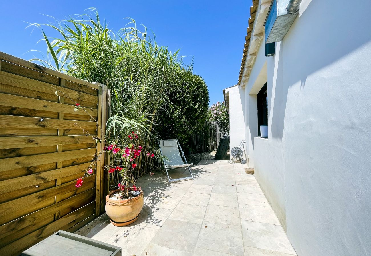terrace with bamboos and deckchair