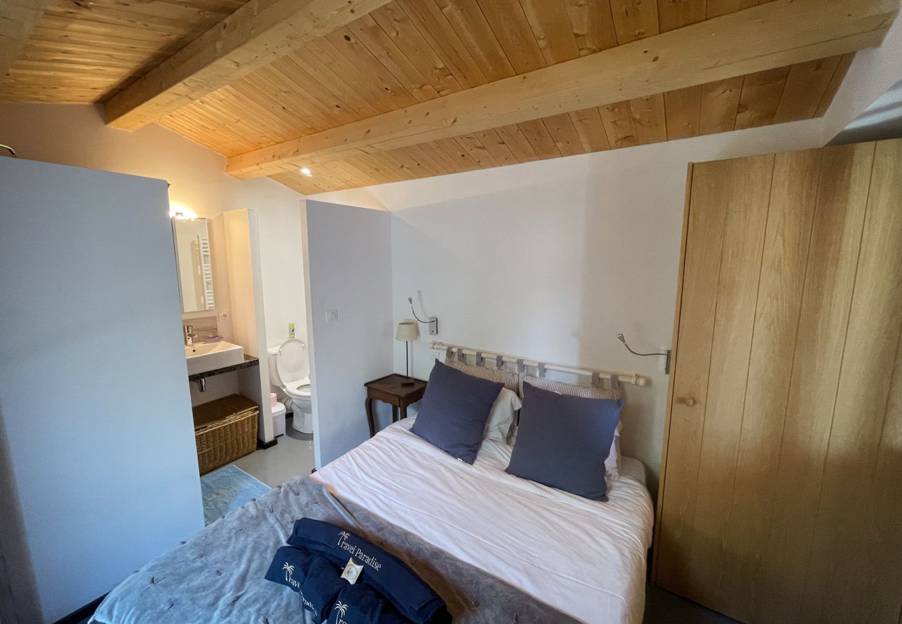 Bedroom with double bed and ensuite bathroom