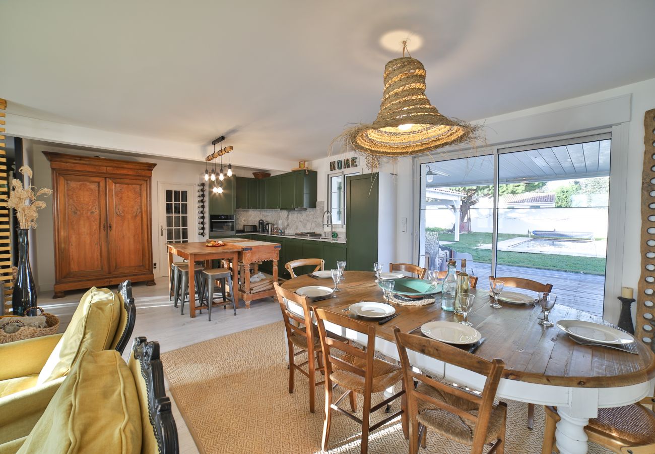 Dining room and kitchen with central island
