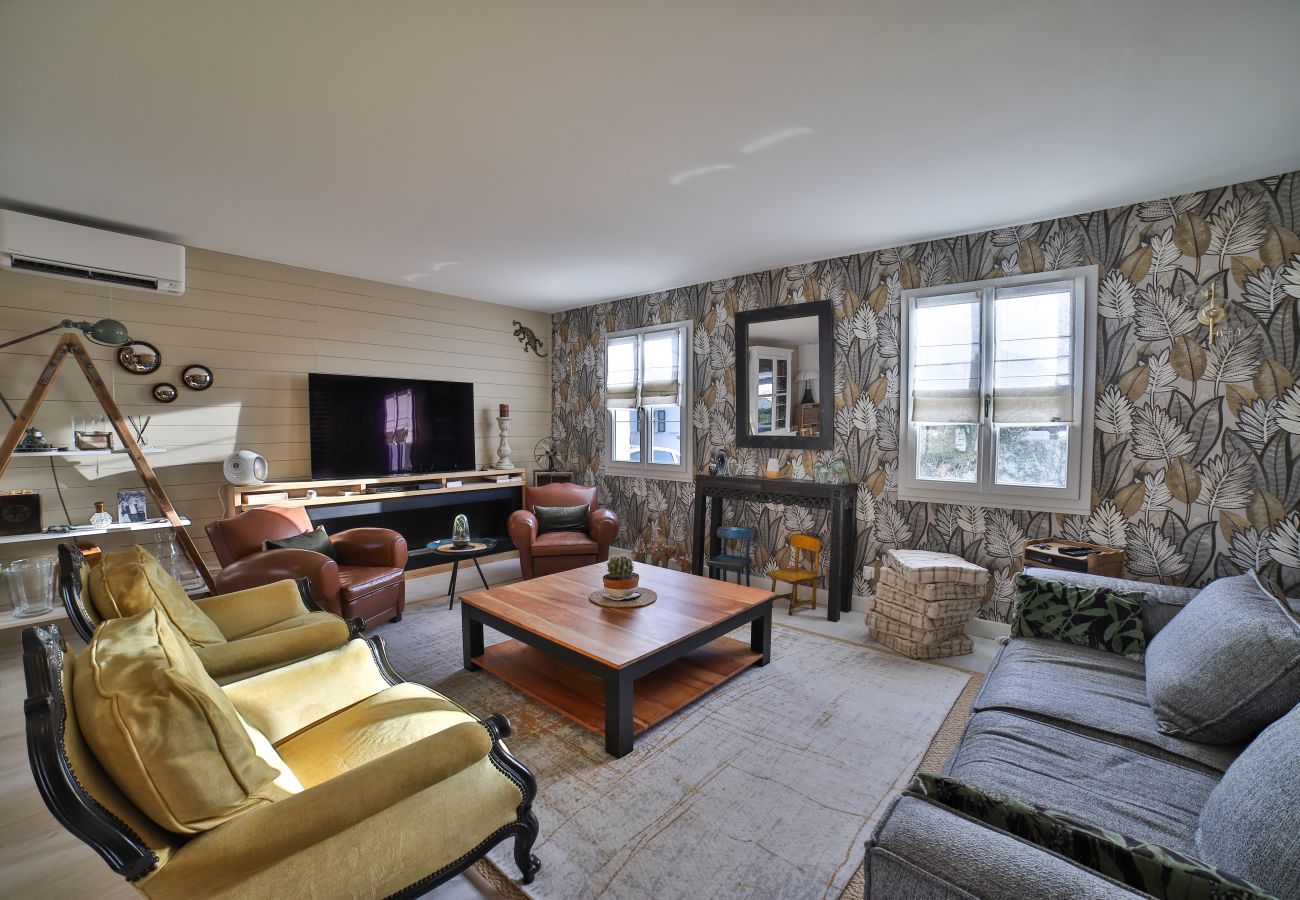 The bright living room with sofas and coffee table