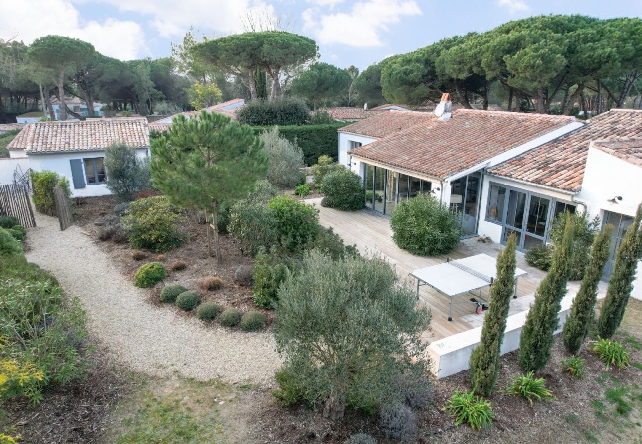 The villa, terrace and garden