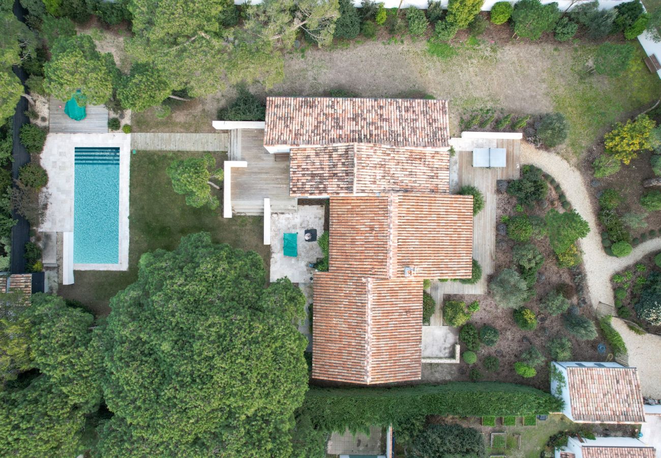 Aerial view of the villa, garden and pool